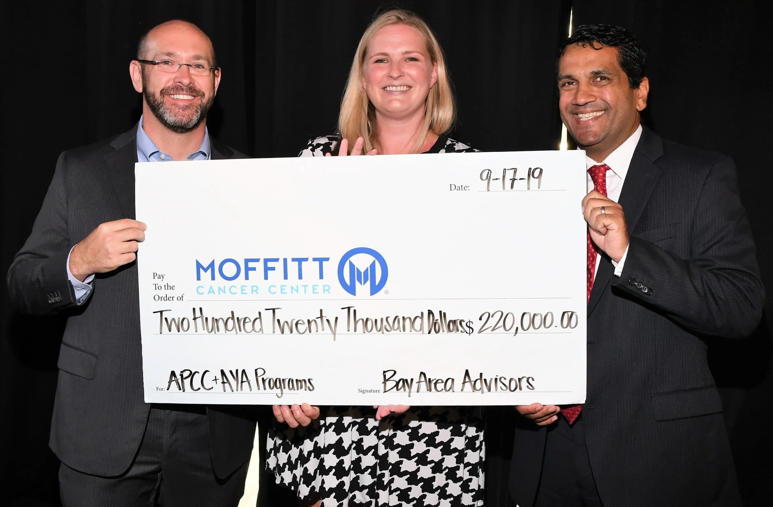 Schwartz Attends Check Presentation to Moffitt Cancer Center